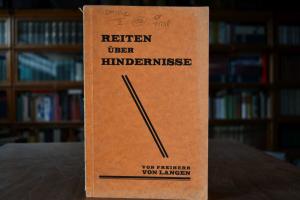 Reiten über Hindernisse.