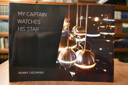 My Captain watches his star.