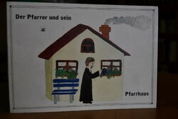 Der Pfarrer und sein Pfarrhaus.