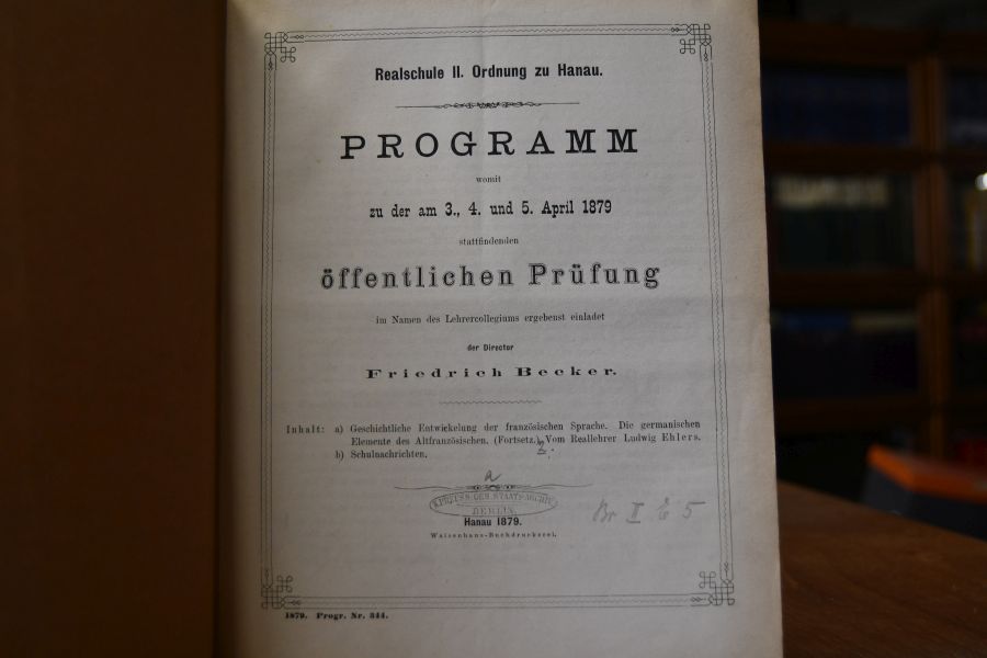 Realschule II. Ordnung zu Hanau. Programm, womit zu der am 3., 4. und 5. April 1879 stattfindenden öffentlichen Prüfung im Namen des Lehrercollegiums ergebenst einladet. Inhalt a) Geschichtliche Entwicklung der französischen Sprache. Die germanischen Elemente des Altfranzösischen (Fortsetz.) vom Reallehrer Ludwig Ehlers b) Schulnachrichten.