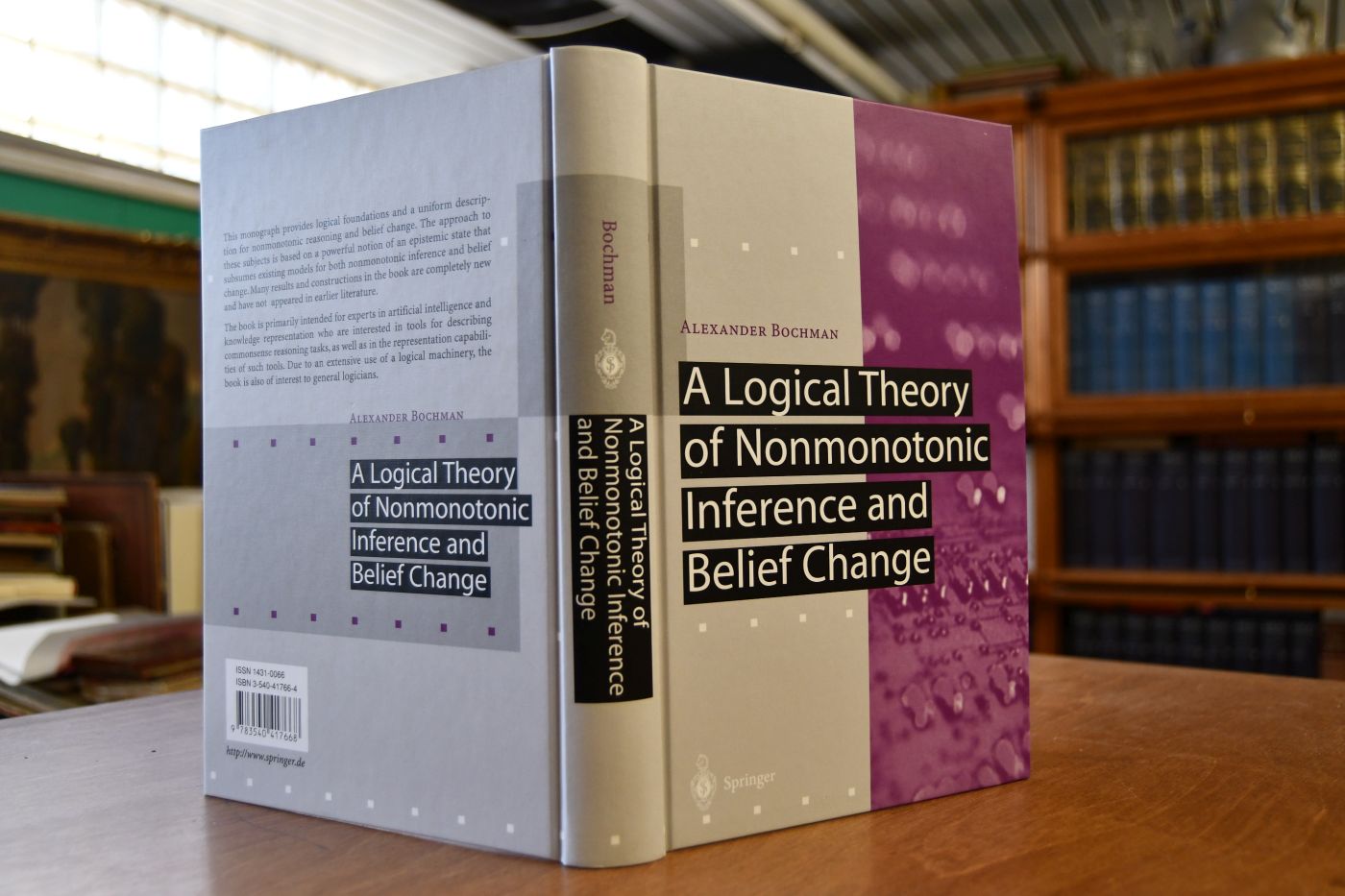 A logical theory of nonmonotonic inference and belief change.