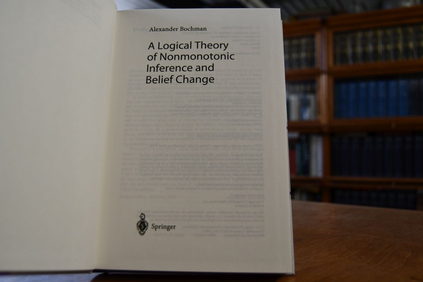 A logical theory of nonmonotonic inference and belief change.