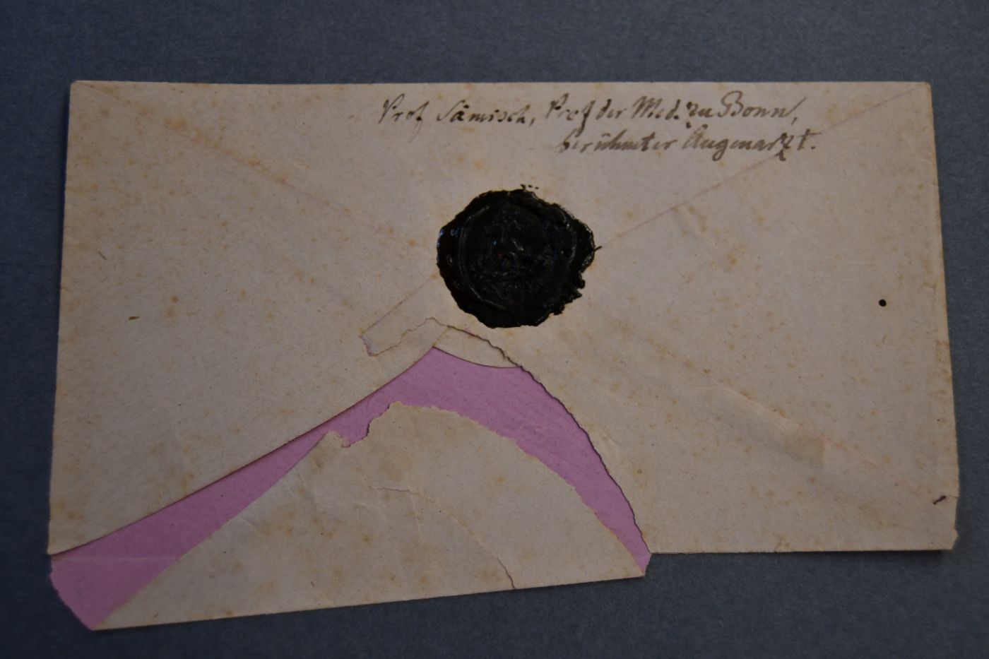 Einseitiger handschriftlicher Brief des Bonner Augenheilkudler Edwin Theodor Saemisch (1833 - 1909) an den Pfarrer und Genealogen Georg Schmidt (1838 - 1920) vom 8. Mai 1875.