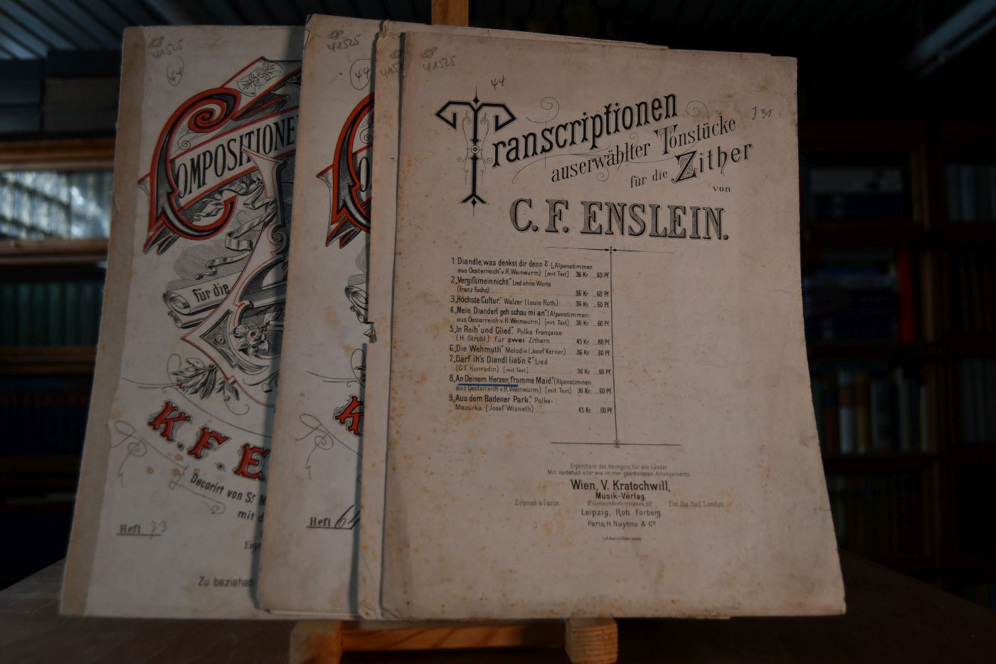 Compositionen u. Transcriptionen für die Zither componirt und herausgegeben. Heft 38, 64, 73. Transcriptionen auserwählter Tonstücke für die Zither von C.F.Enslein Nr. 1, 7, 8.